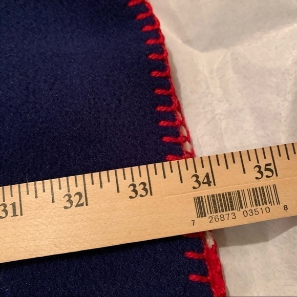 The flag scarf is cozy and soft to the touch. - Picture 9 of 13